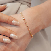 NUDE SHIMMER - 18ct gold, medium pear tennis bracelet