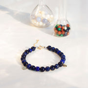 The Alkemistry 18ct yellow gold Lapis and blue goldstone Cinta bracelet